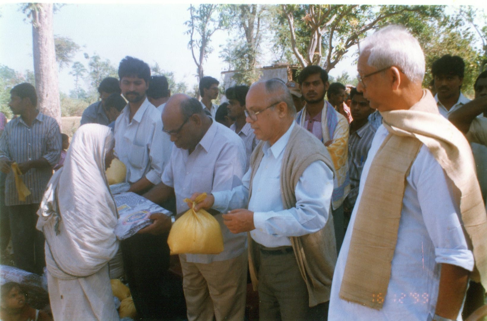 Blanket and Food distribution Dec,1999 after cyclone in Ganjam area